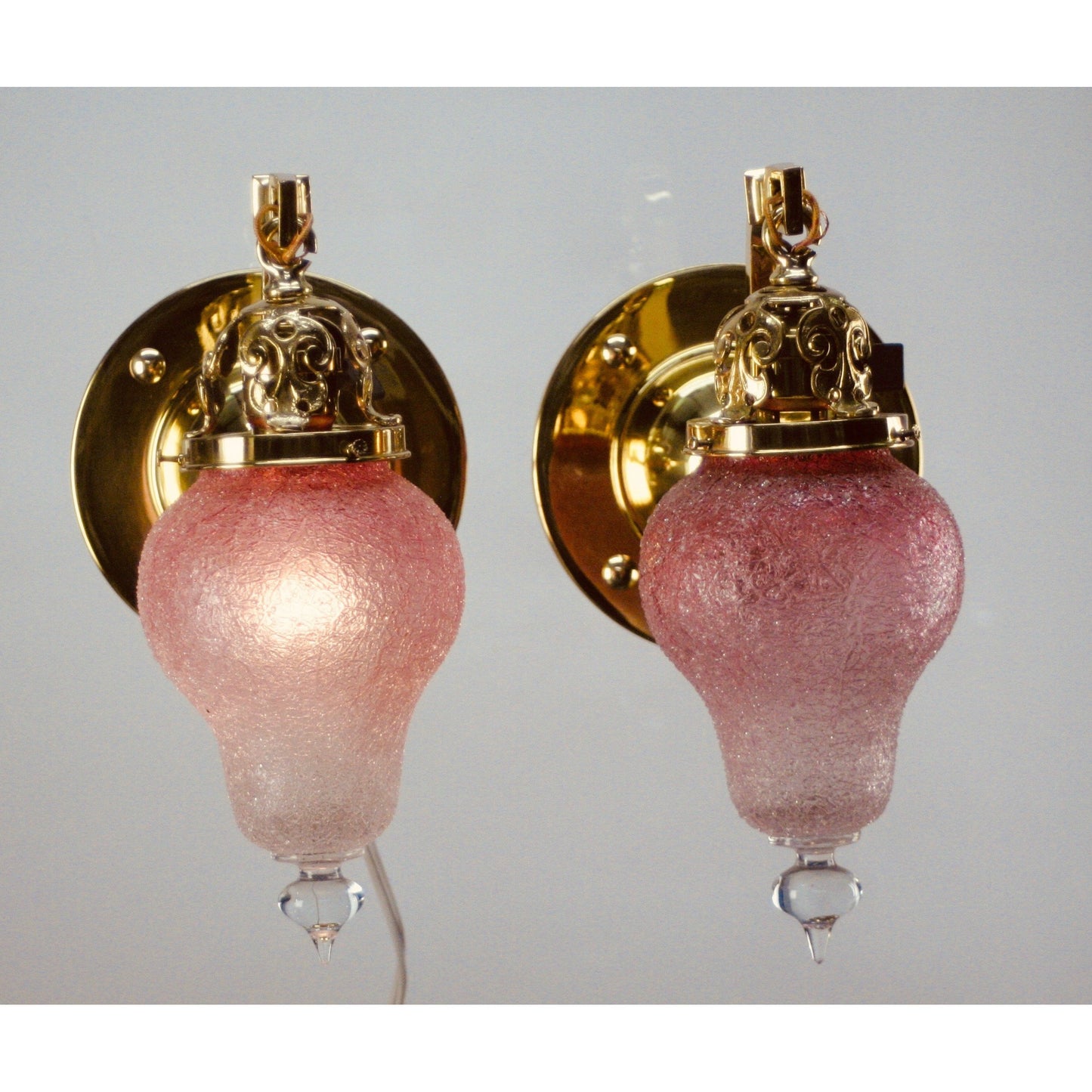 Polished brass antique wall sconces, restored, with Loetz Art Glass shades