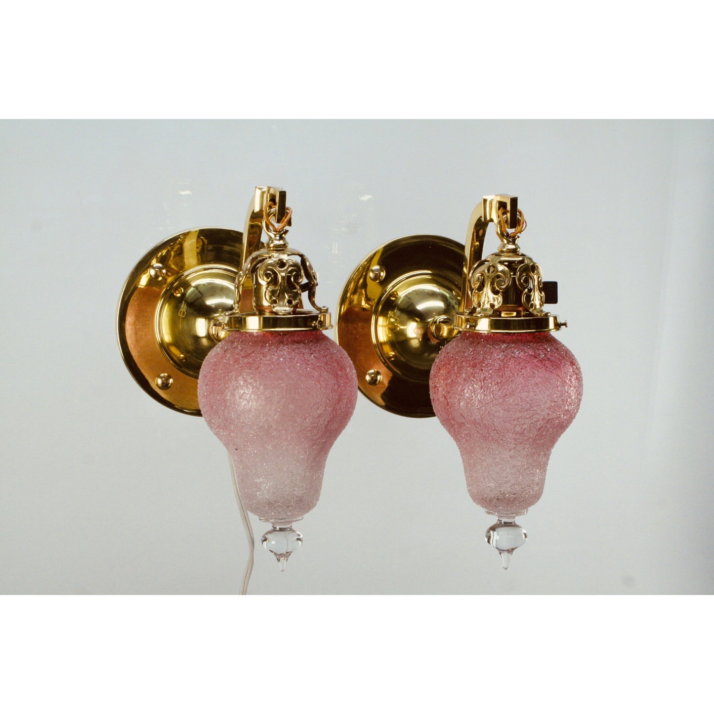 Polished brass antique wall sconces, restored, with Loetz Art Glass shades