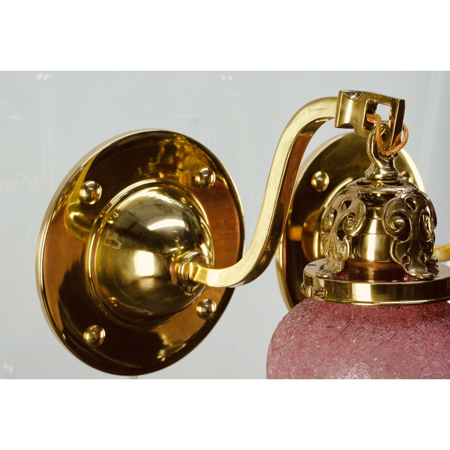 Polished brass antique wall sconces, restored, with Loetz Art Glass shades