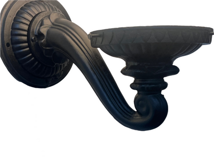 1910s Wall-mounted light fixture with a round glass shade