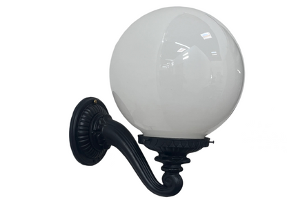 1910s Wall-mounted light fixture with a round glass shade