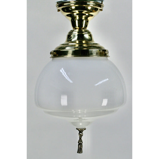 milk glass light with polished brass fixture