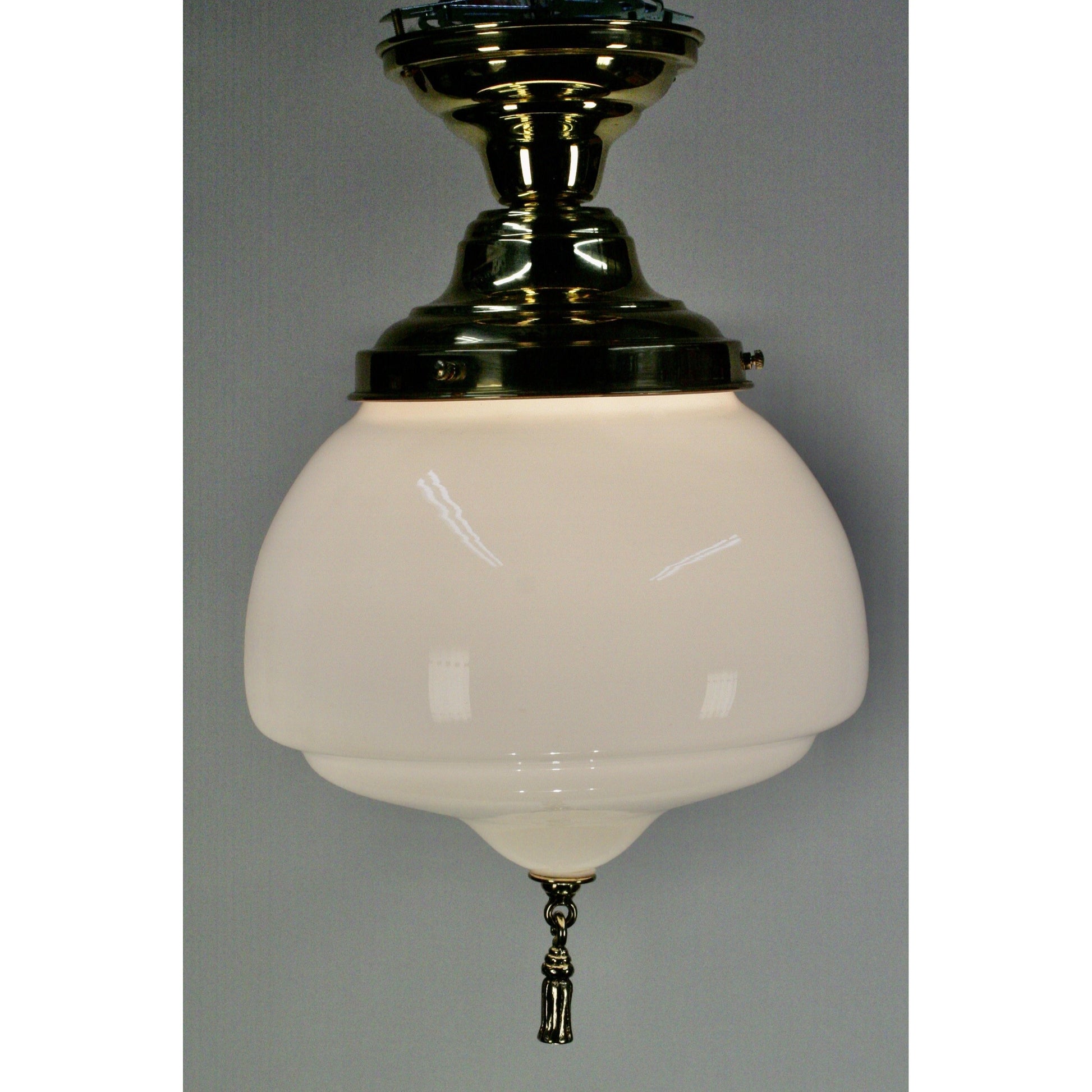 milk glass light with polished brass fixture