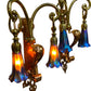 Side view oof nouveau sconces in manner of WAS Benson art glass shades