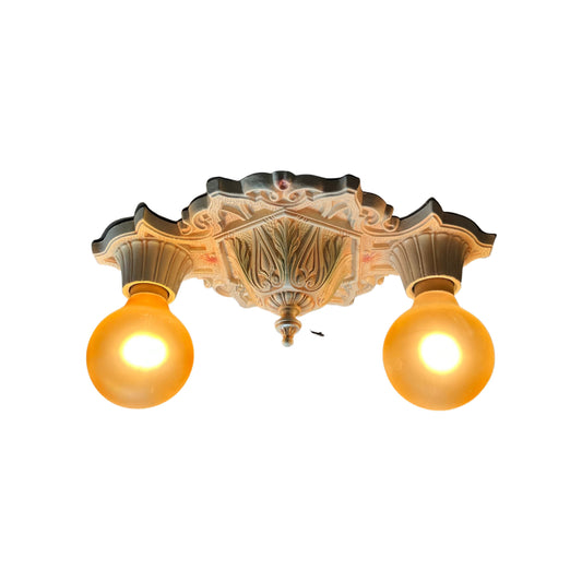 1920s two light flush mount light with  painted Mazda bulbs
