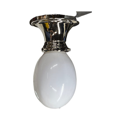 Nickel bathroom sconce with milk glass shade