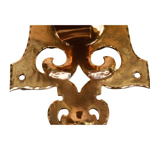 detail of hammered copper wall sconces